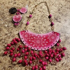 Hot pink necklace with handmade clay piece.